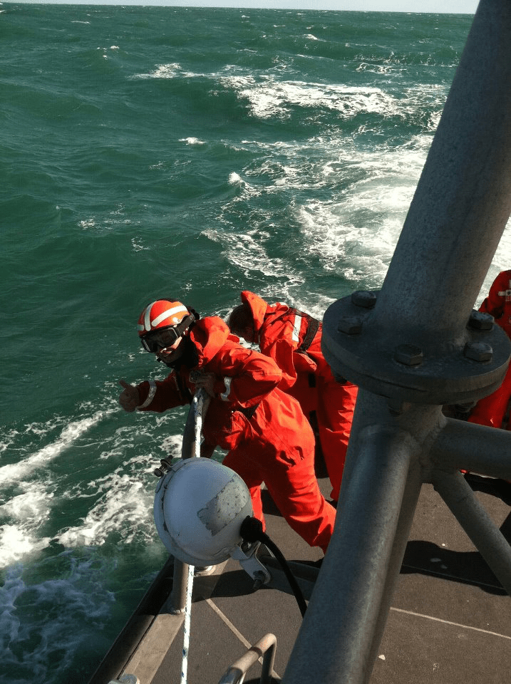 Oh just blowing chunks on the aft(rear deck) of the 47' motor life boat.  But I never miss a photo op.  